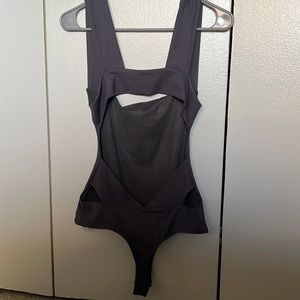 Free people purple bodysuit with cutouts in the back